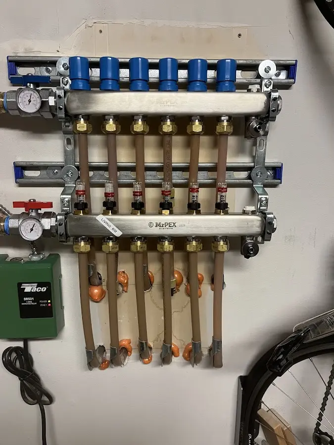 Plumber performing Gas Line Installation at a residential property in Long Lake